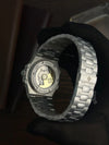Close-up of luxury men's automatic watch back with stainless steel band, Ministry of Mens Affair