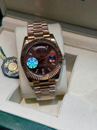 Rolex day-date chocolate rose gold