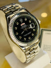 Luxury men's stainless steel Rolex watch with black dial and diamond hour markers on display