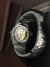Back view of luxury men's stainless steel watch with open mechanical movement, showcased by Ministry of Mens Affair.