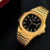 Luxury gold men’s watch with black dial and date display on black background.