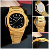 Luxury gold men’s wristwatch with black dial, premium Patek Philippe Nautilus design, showcased at Ministry of Mens Affair.
