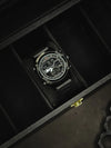 Black men's luxury digital watch in a display case, stylish modern design