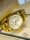 Luxury gold men's watch with diamond markers on display at Ministry of Mens Affair