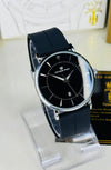 Men’s black dial luxury watch with black strap, modern design, stylish accessory for men