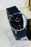 Men’s black Universe Point watch with silver details and silicone strap on display stand